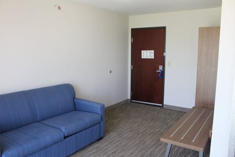 Suite, 1 King Bed (Additional Living and Dining Area) | In-room safe, desk, iron/ironing board, cribs/infant beds