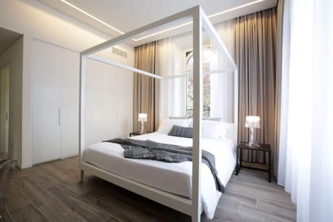 Deluxe Double Room, Garden View | Premium bedding, minibar, in-room safe, desk