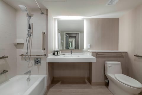 Room, 1 King Bed with Sofa bed | Bathroom | Designer toiletries, hair dryer, towels