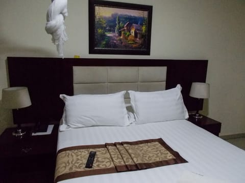 Deluxe Room, Balcony, Garden View | In-room safe, individually decorated, individually furnished, desk