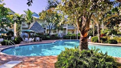 The pool is surrounded by plenty of chaise lounges...
