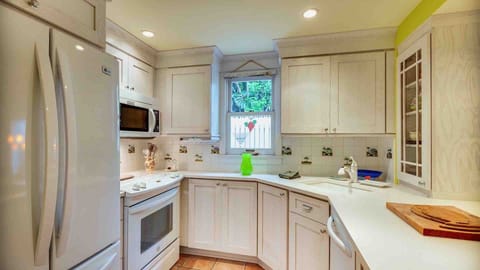 The kitchen is fully equipped with every appliance and tool needed to prepare a meal from home...