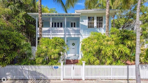 MAISON TROPICALE is a stunningly restored 3 bedroom classic Key West home...