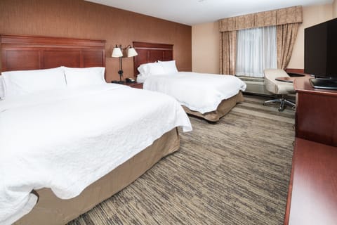 Desk, blackout drapes, iron/ironing board, free cribs/infant beds