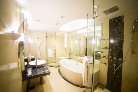 Executive Suite, 1 Bedroom | Bathroom | Shower, free toiletries, hair dryer, bathrobes