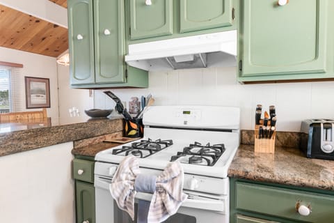 Kitchen - Full kitchen with stove/oven, refrigerator, dishwasher, microwave, blender, toaster, coffee maker, dishes, pots/pans, & more.