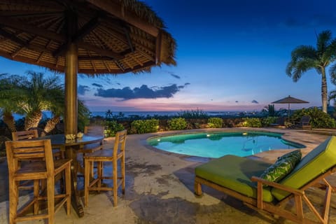 Nighttime Views of the Ocean and Pool at Hale Akoa