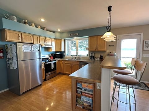 Spacious and well-equipped kitchen with all your creature comforts of home.