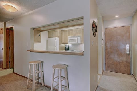 Kitchen counter offers a couple of bar stool seating
