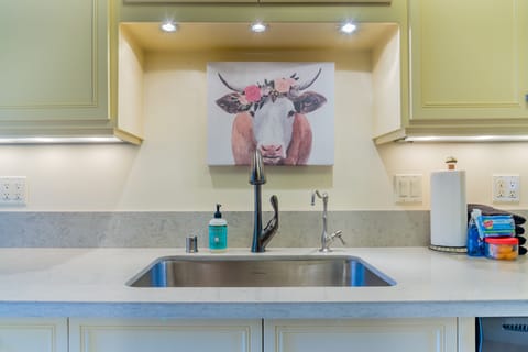 Kitchen - A cute picture adorns the kitchen sink to make you smile while cleaning up after a great meal