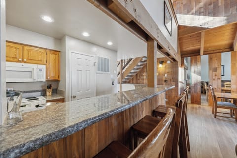 Jump up to the bar with 3 stools for quick meals