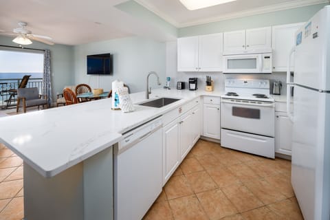 Kitchen - Fully equipped kitchen has all utensils, cookware, pots and pans one needs for basic cooking.