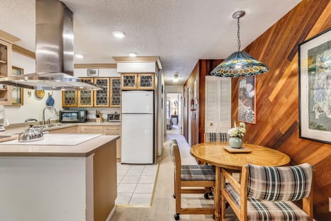 View towards bedroom, full bath and laundry closet