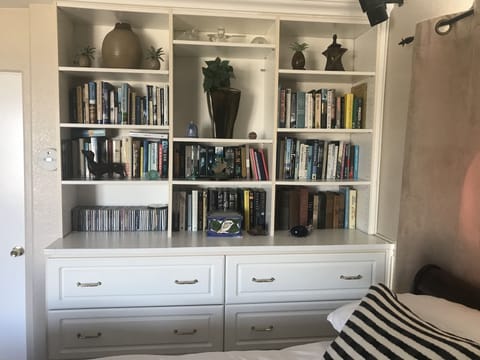 Many books, knick knacks, movie dvd's, etc.