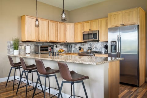 Enjoy seating for four at the breakfast bar