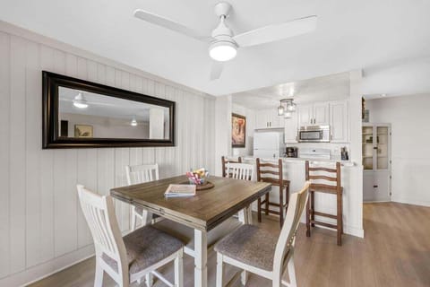 The dining space has enough seating for four guests.