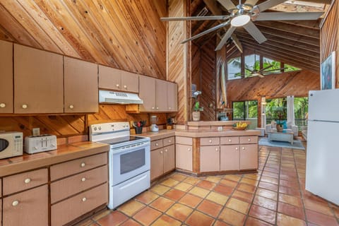 Kitchen is fully equipped with pots, pans and utensils