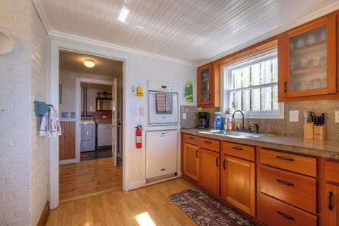 Kitchen - New fir cupboards fully stocked.