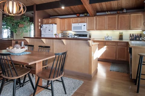 dining area with big center ideal that's perfect for serving up a buffet meal to your group