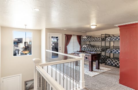 Loft Room - Unenclosed loft room with access to the front patio