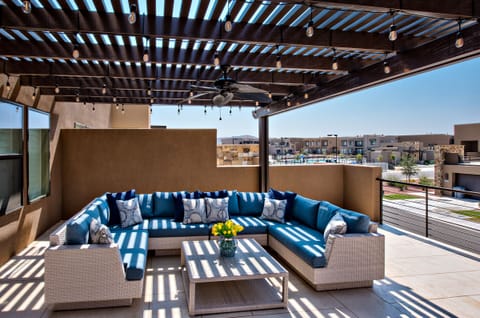 Upstairs Patio Overlooking Community Pool - From the covered patio you can overlook the community pool and watch the kids play and enjoy the neighborhood amenities.