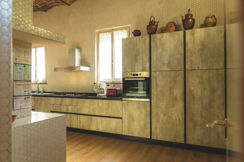 Cabinetry, Countertop, Property, Furniture, Kitchen, Tap, Window, Building, Wood, Interior Design