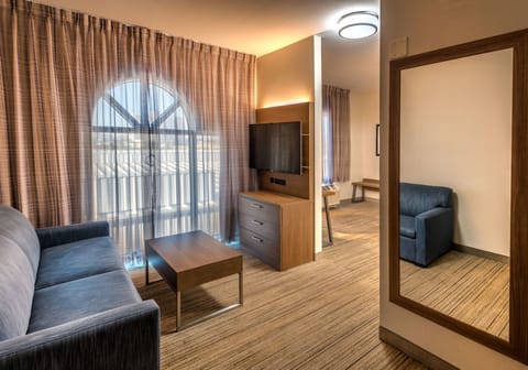 Suite, 1 King Bed, Jetted Tub | In-room safe, desk, iron/ironing board, free cribs/infant beds