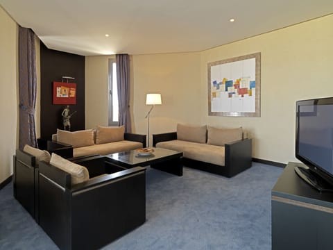 Suite, Sea View (Ambassador) | Living area | Plasma TV