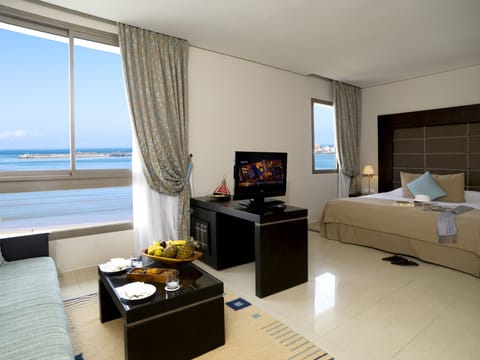 Deluxe Room, Sea View | Premium bedding, minibar, in-room safe, individually decorated