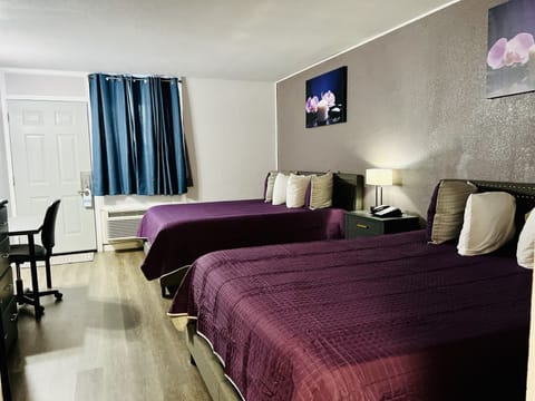 Premium Room, 2 Queen Beds | Blackout drapes, iron/ironing board, free WiFi, bed sheets