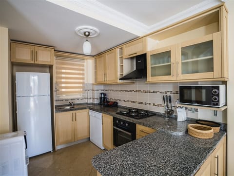 Villa, 4 Bedrooms, Private Pool | Private kitchen | Oven, dishwasher, cookware/dishes/utensils, cleaning supplies