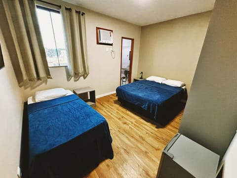 Comfort Triple Room | Blackout drapes, iron/ironing board, free WiFi, bed sheets