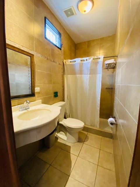 Double Room, 2 Double Beds | Bathroom | Shower, free toiletries, towels