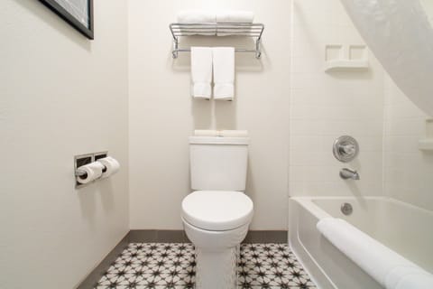 King Suite Sleeper Sofa | Bathroom | Combined shower/tub, eco-friendly toiletries, hair dryer, towels