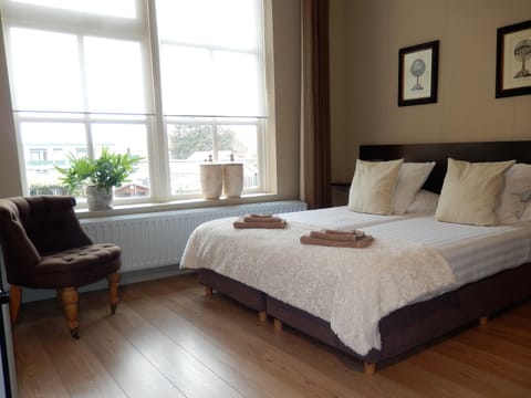 Standard Double Room, 2 Twin Beds | Blackout drapes, iron/ironing board, free WiFi, bed sheets