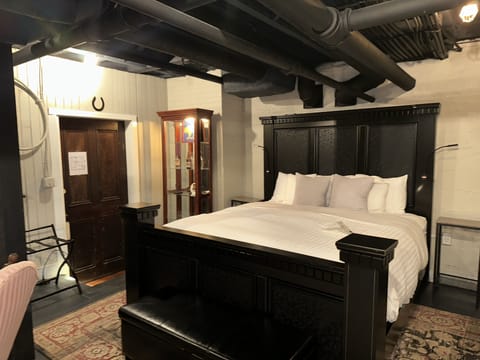 Industrial Patent Suite | Premium bedding, down comforters, pillowtop beds, free WiFi