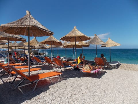 Private beach, sun loungers, beach umbrellas