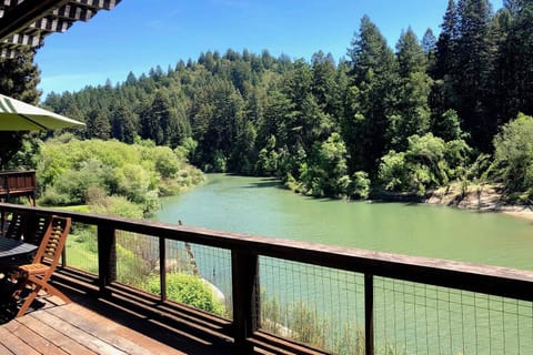 Views of the river in the summer, looking upstream from the spacious back deck.