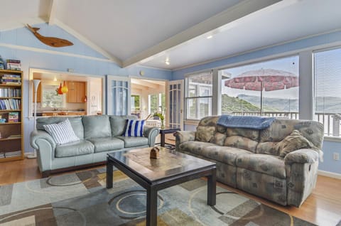 Get cozy in the living room - windows all around.