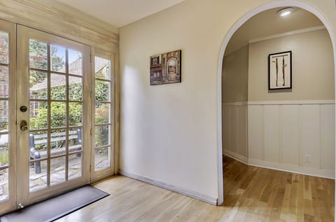 Additional exterior door from the parking area closer to the primary bedroom.
