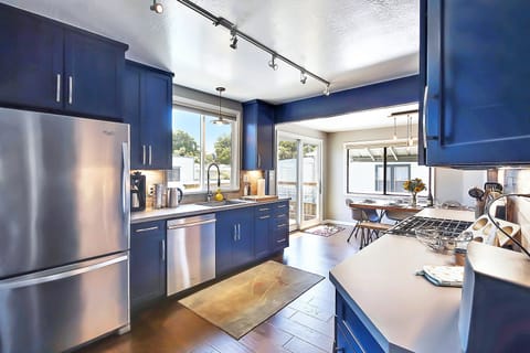 The inviting kitchen has loads of light.