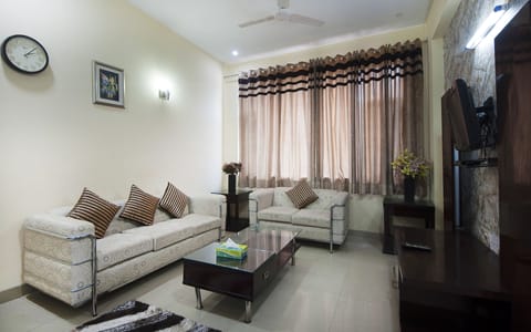 Luxury Apartment, 1 Bedroom, City View | Living area | Flat-screen TV