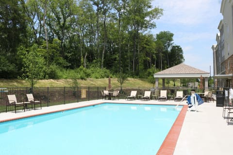 Seasonal outdoor pool, open 7 AM to 10 PM, sun loungers