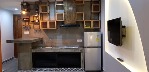 Luxury Condo | Private kitchen | Full-size fridge, microwave, stovetop, electric kettle