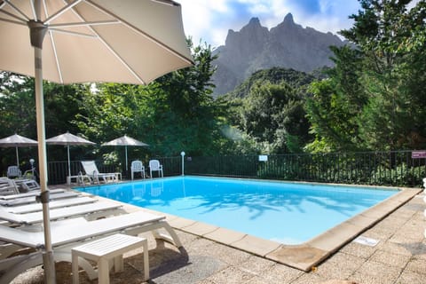 2 outdoor pools, pool umbrellas, sun loungers