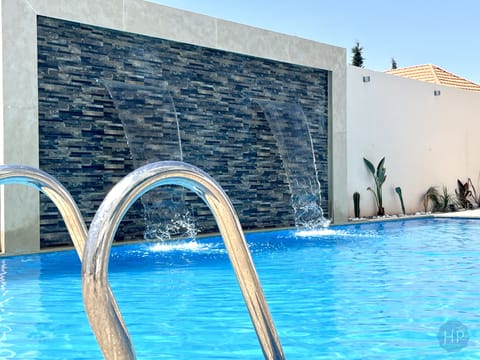 Outdoor pool, open 10:30 AM to 8:00 PM, pool umbrellas, sun loungers