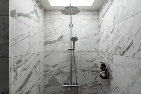 Shower, hydromassage showerhead, designer toiletries, hair dryer