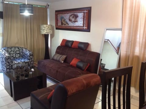 Family Townhome, 2 Bedrooms | Living area | Flat-screen TV