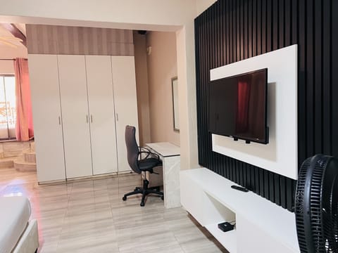 Superior Double Room | Living area | 42-inch LED TV with satellite channels, TV