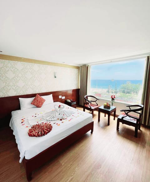 Deluxe Double Room, Sea View | Premium bedding, minibar, in-room safe, desk